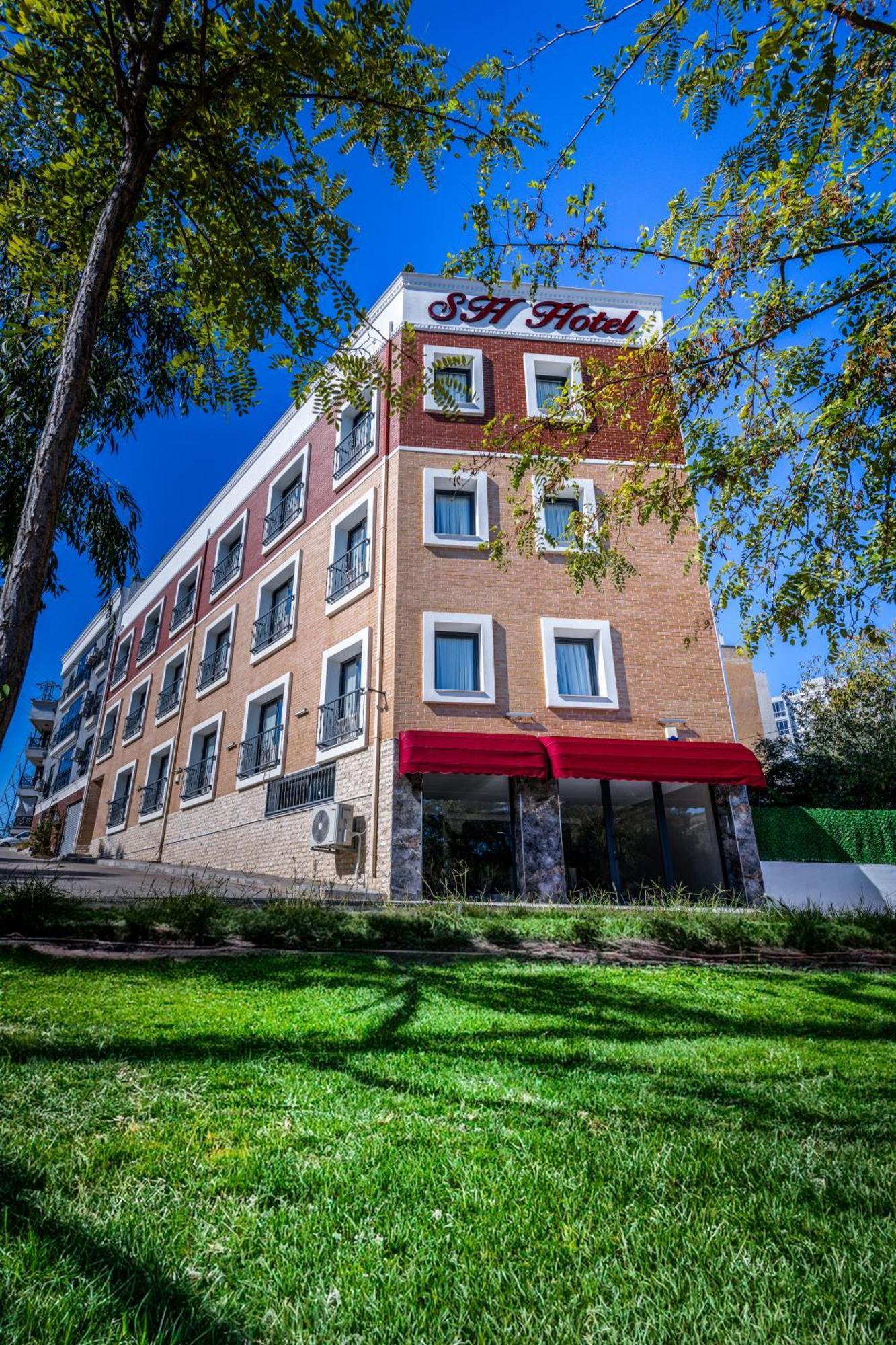 Sh Business Hotel *